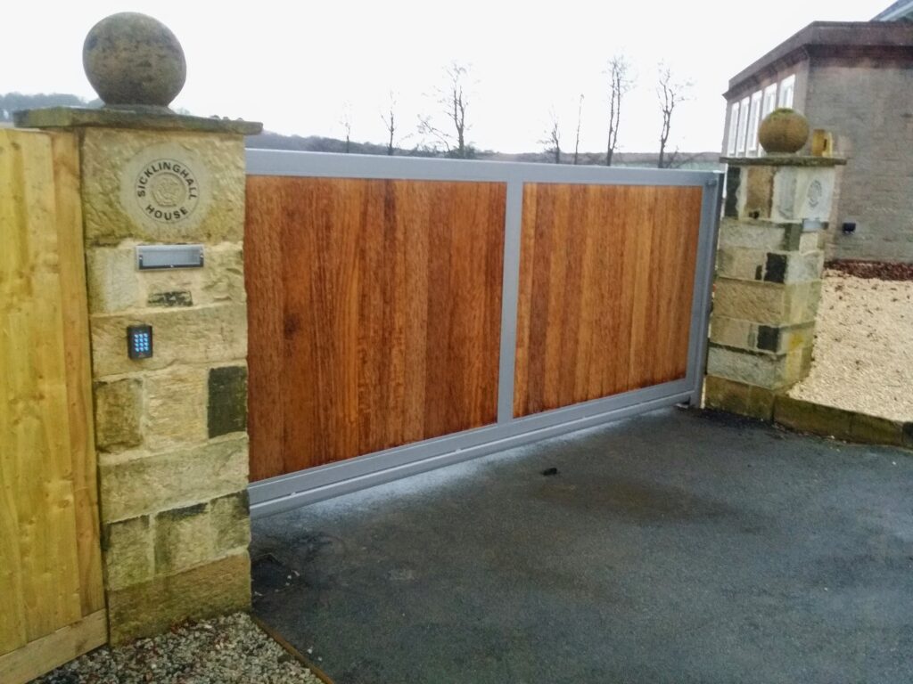 20150109_154147 Wooden driveway gate with aluminium frame and keypad entry