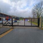 Metal mesh sliding gate installed at the entrance of a commercial and industrial site