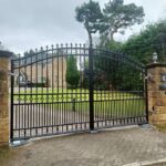 wrought iron ornate electric swing gates fitted to a domestic property in leeds